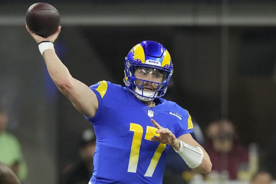 Rams quarterback Baker Mayfield throws a pass