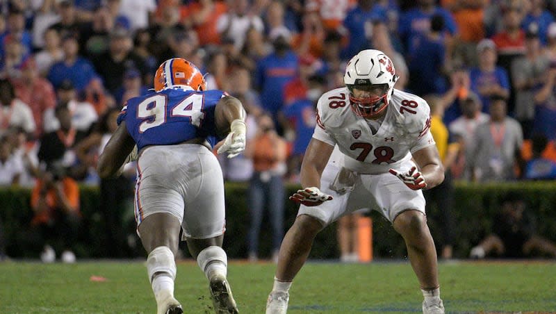 Utah offensive lineman Sataoa Laumea sets up to block in front of Florida defensive lineman Tyreak Sapp during game, Saturday, Sept. 3, 2022, in Gainesville, Fla.