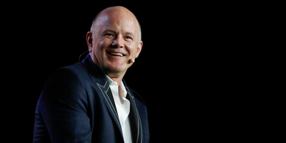 This is a phot of Michael Novogratz speaking in stage with a black background.
