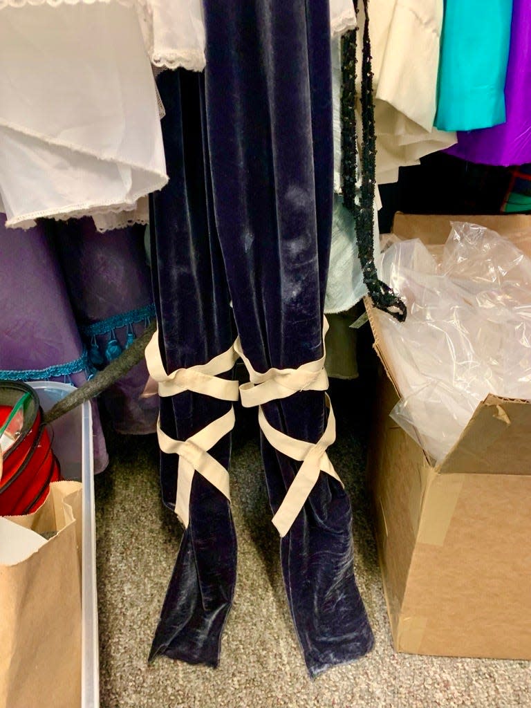 Ribbons sewn onto a costume allow a ballerina to transition to another role without needing to lace up for the Wilmington Ballet Academy of the Dance's 56th annual production of The Nutcracker.