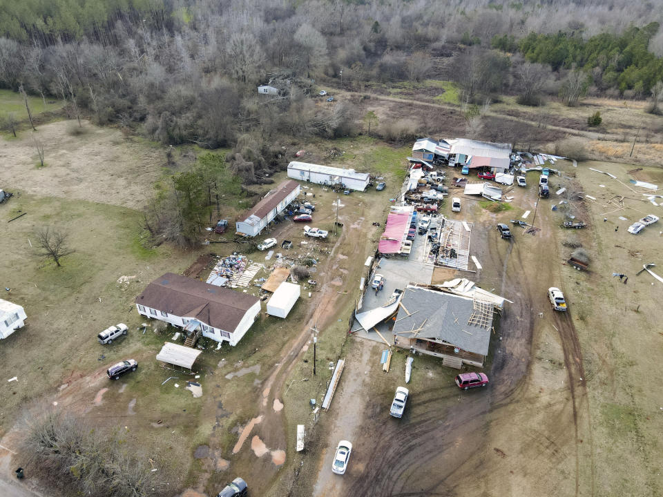 Devastation is seen in the aftermath from severe weather, Thursday, Jan. 12, 2023, in Moundville, Ala. A giant, swirling storm system billowing across the South spurred a tornado on Thursday that shredded the walls of homes, toppled roofs and uprooted trees. (Mike Goodall via AP)