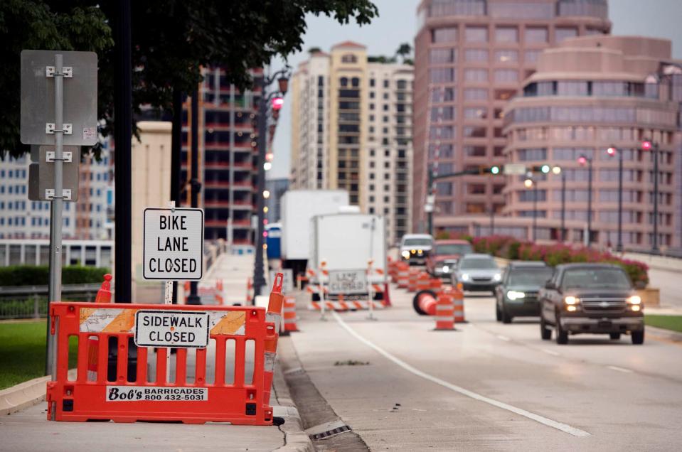 Traffic headed east from West Palm Beach to Palm Beach is funneled into one lane on the Royal Park bridge early Wednesday. The right lane is closed to traffic because of the Royal Park Bridge painting project.