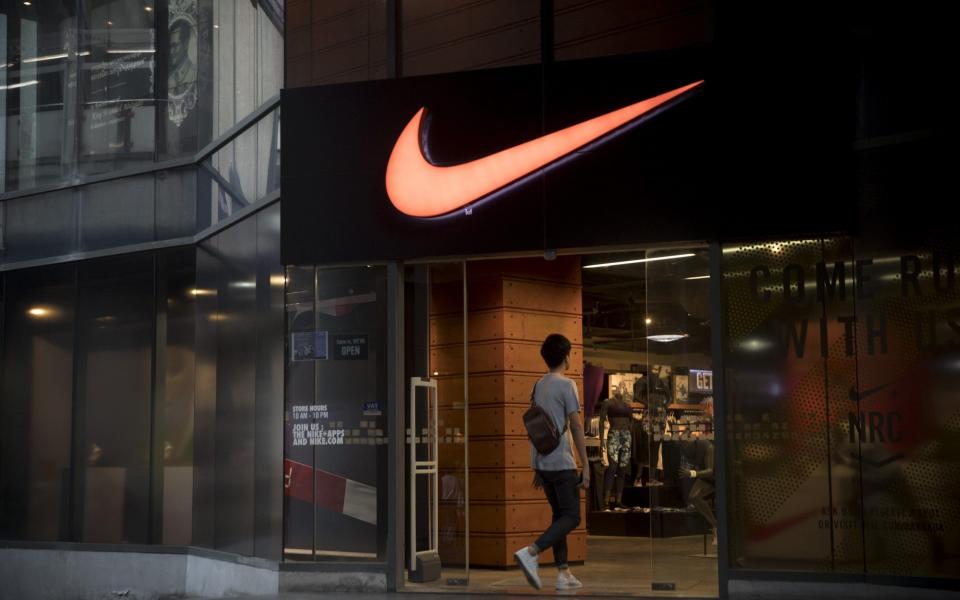 Nike faces $530m tax fine over claims it misclassified temporary workers - Brent Lewin/Bloomberg