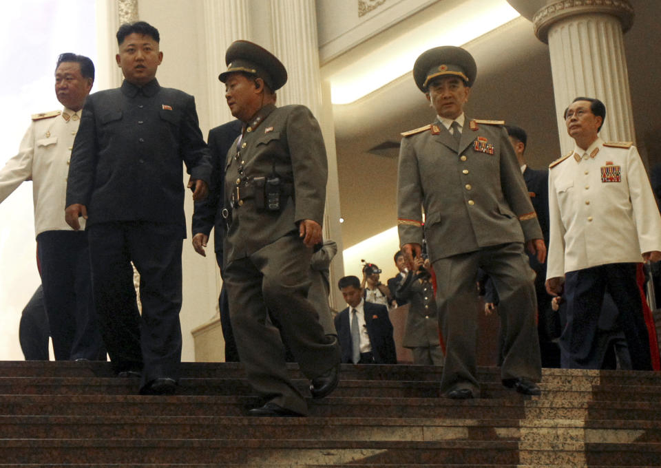 FILE - In this July 27, 2013, file photo, North Korean leader Kim Jong Un, second left, flanked by Yang Hyong Sop, second right, vice president of the Presidium of North Korea's parliament, his uncle Jang Song Thaek, right, and Choe Ryong Hae, vice Marshal, left, as he tours the newly opened Fatherland Liberation War Museum, as part of celebrations for the 60th anniversary of the Korean War armistice in Pyongyang, North Korea. Despite Beijing’s opposition, Kim carried out a torrid run of weapons tests while pursuing a nuclear arsenal capable of targeting the U.S. mainland. Kim also executed a slew of senior officials, including his uncle, Jang, who had close ties with China, on treason charges. (AP Photo/Wong Maye-E, File)