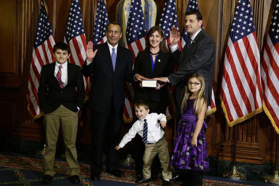 House Speaker John Boehner of Ohio performs a mock swearing in for Rep. David Valadao, R-Calif., Thursday, Jan. 3, 2013, on Capitol Hill in Washington as the 113th Congress began. (AP Photo/Charles Dharapak) 