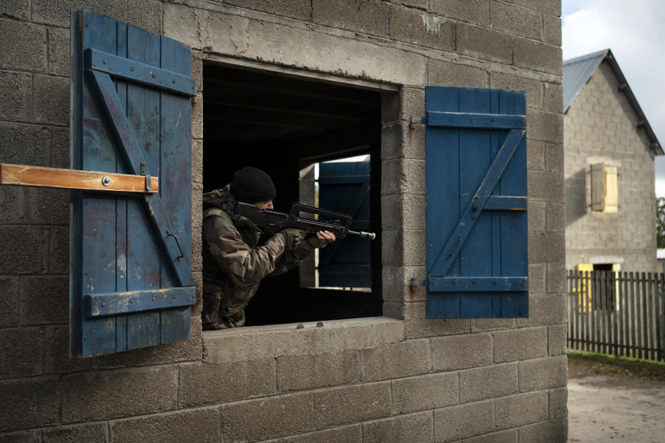 Ukrainian infantrymen train with French soldiers to learn combat skills, in France, Tuesday, Nov. 7, 2023. With the full-scale war grinding into a second winter, and casualties already counted in the hundreds of thousands continuing to mount on both sides, the training has become crucially important for Ukraine's chances of victory. (AP Photo/Laurent Cipriani)