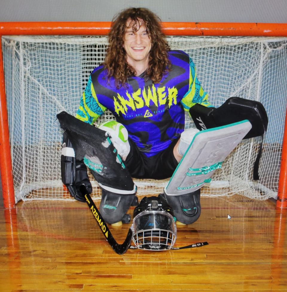 Dillon Barton positing in front of the goalie's cage at Skate-A-Way rink in Ocala, FL.