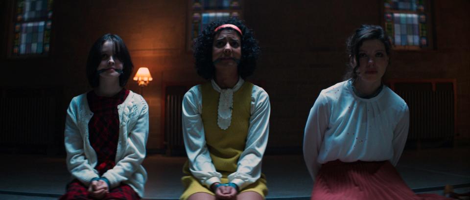 THE SACRIFICE GAME, from left: Georgia Acken, Madison Baines, Chloe Levine, 2023. © Shudder / Courtesy Everett Collection