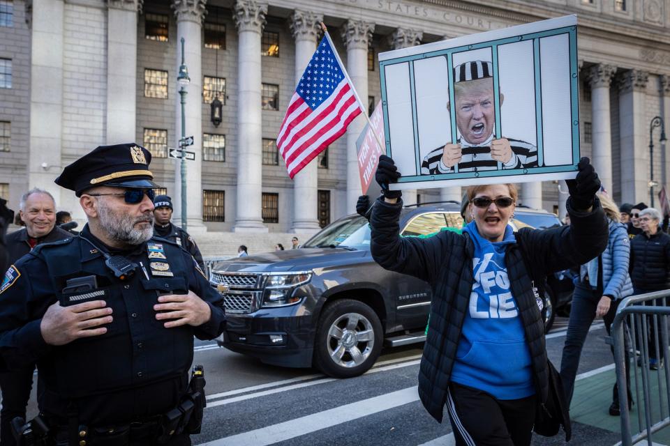 Protesters have gathered outside the court (AP)