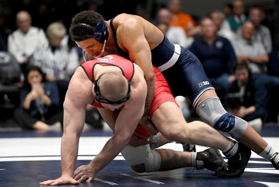 Penn State’s Greg Kerkvliet wrestles Ohio State’s Nick Feldman in the 285 lb bout during the match on Friday, Feb. 2, 2024 in Rec Hall.