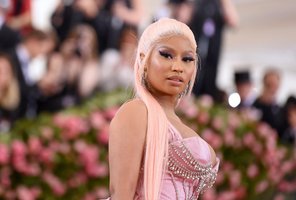 Nicki Minaj wears a pink dress and wig at The 2019 Met Gala Celebrating Camp: Notes on Fashion at Metropolitan Museum of Art on May 06, 2019 in New York City.