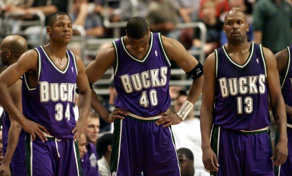 Milwaukee Bucks' Ray Allen, left, Ervin Johnson and Glenn Robinson looks on in the fourth quarter against the Philadelphia 76ers' during game 5 of the Eastern Conference finals Wednesday, May 30, 2001 in Philadelphia. The 76ers won 89-88 to take a 3-2 lead in the best-of-seven series.