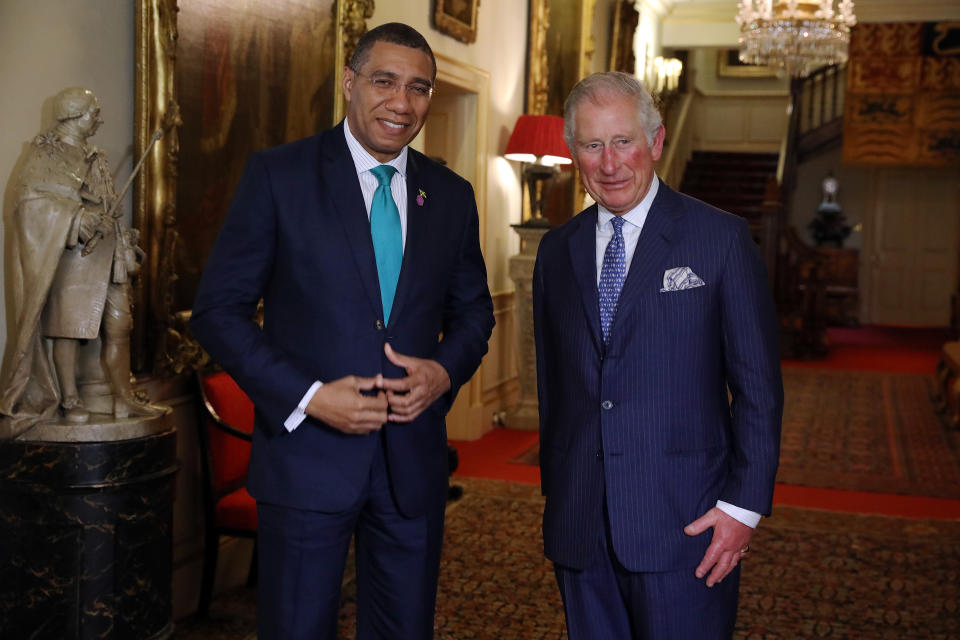 Charles - then Prince of Wales - greets Jamaican Prime Minister Andrew Holness at Clarence House in 2018. (Getty Images)