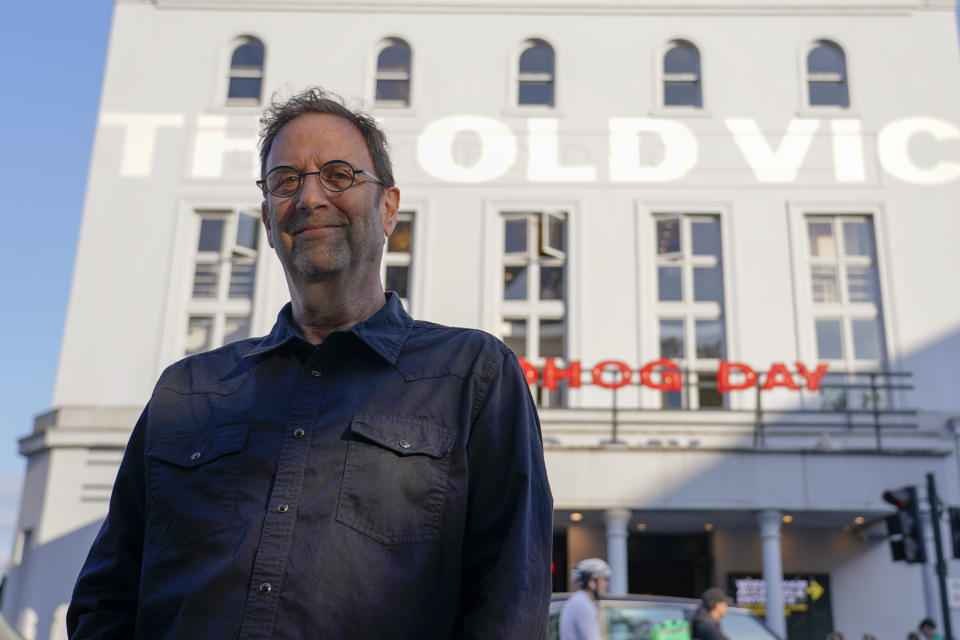 Screenwriter and playwright Danny Rubin poses outside the Old Vic Theatre, in London, Monday, June 5, 2023. “Groundhog Day” is back. Again. The story of a jaded weatherman fated to live the same day over and over began as a beloved movie, then became an award-winning stage musical. On Thursday, June 8 it opens at London’s Old Vic Theatre, seven years after its triumphant debut in the same venue. (AP Photo/Alberto Pezzali)