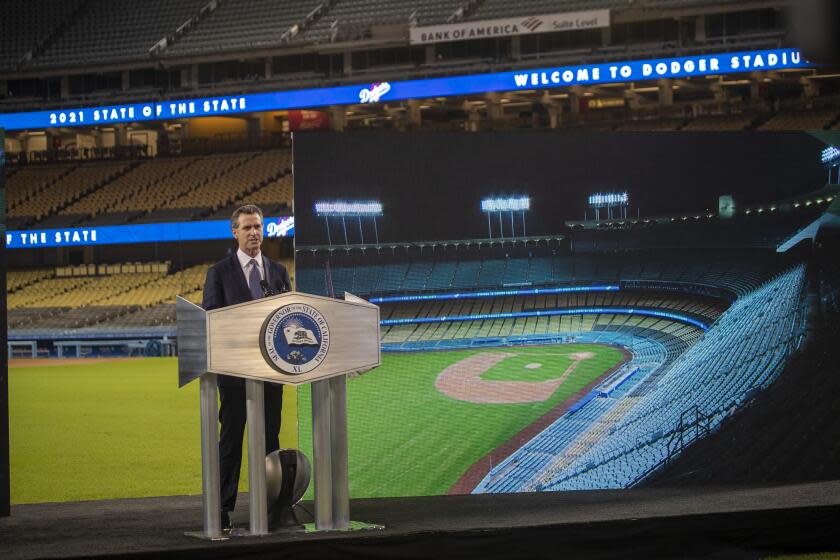 LOS ANGELES CA - March 09: Gov. Gavin Newsom delivers his third State of the State address to the Legislature and public virtually from en empty Dodger Stadium in Los Angeles Tuesday, March 9, 2021. There is no in-person audience at the outdoor location and public health guidelines are strictly observed. Photo taken at Dodger Stadium on Tuesday, March 9, 2021 in Los Angeles, CA. (Allen J. Schaben / Los Angeles Times)