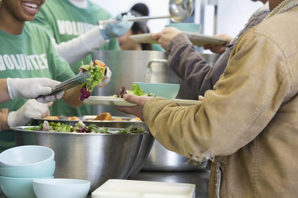 <p>If you're looking for a way to give back, why not volunteer to cook or serve a holiday meal at your local soup kitchen. (Bonus: Doing so as a family is a great way to teach kids that Christmas is about so much more than presents!) To find local food banks near you, check out <a href="https://www.feedingamerica.org/find-your-local-foodbank?referrer=https://www.google.com/" rel="nofollow noopener" target="_blank" data-ylk="slk:Feeding America;elm:context_link;itc:0;sec:content-canvas" class="link ">Feeding America</a> or <a href="https://www.foodpantries.org/" rel="nofollow noopener" target="_blank" data-ylk="slk:FoodPantries.org;elm:context_link;itc:0;sec:content-canvas" class="link ">FoodPantries.org</a>.</p>