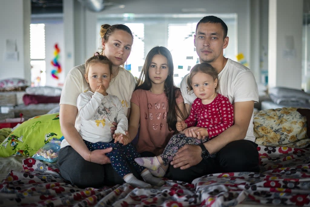 (not real names) Ukrainian refugees Elena Sidorova, her husband Vladimir, and their daughters Polina, Eva and Zlata (Kirsty O’Connor/PA) (PA Wire)