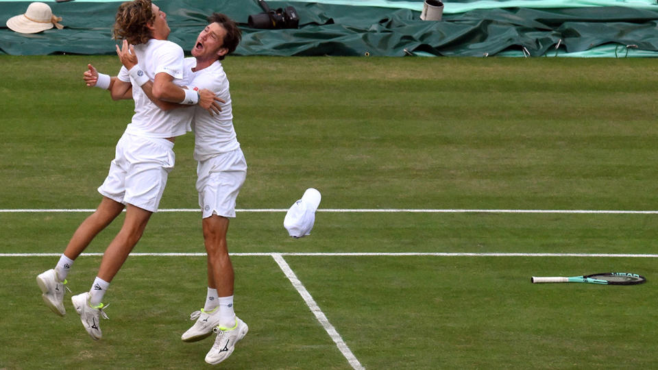 Max Purcell and Matt Ebden celebrate after winning the men's doubles fin at Wimbledon. (Photo by DANIEL LEAL/AFP via Getty Images)