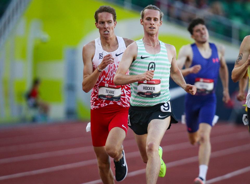 Cole Hocker, right, sprints to win his heat in the first round of the men’s 1,500 meters as Cooper Teare narrowly misses the qualifying spot on day one of the USA Outdoor Track and Field Championships at Hayward Field in Eugene Thursday, July 6, 2023.
