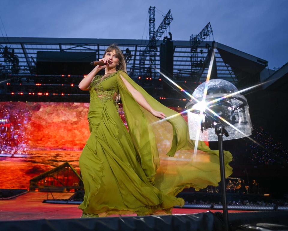 <p>Gareth Cattermole/TAS24/Getty </p> Taylor Swift performs on June 13, 2024 in Liverpool, England