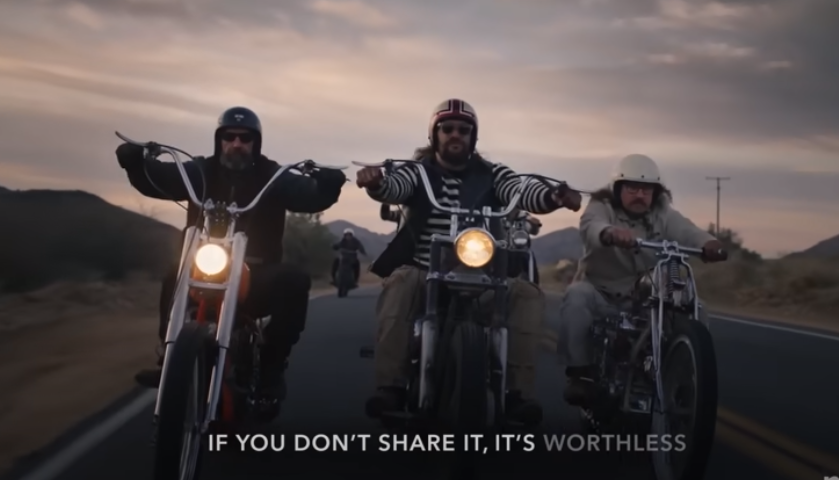 a group of men riding motorcycles