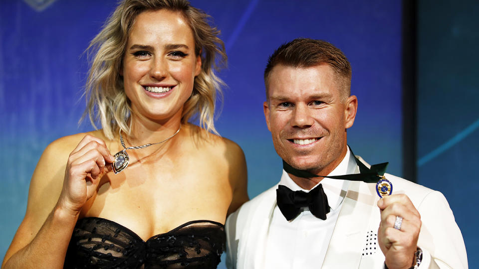 Ellyse Perry and David Warner, pictured here at the Australian Cricket Awards with their medals.