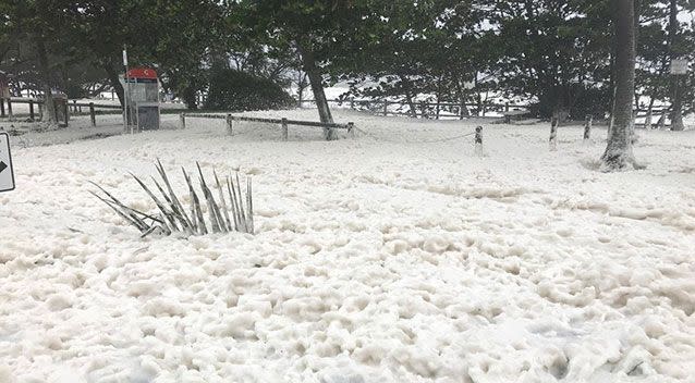 Sarina Beach looking more like a bubble bath after wild wave due to Debbie. Source: 7 News