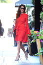 <p>Lady in red! Clooney was spotted in Manhatten looking stunning in a knee-length red wrap dress with tie-waist detailing and bell sleeves. She finished off the look with a classic black bag, her signature cat eye sunglasses and neutral pumps. <i>(Photo by Josiah Kamau/BuzzFoto via Getty Images)</i><br><br></p>