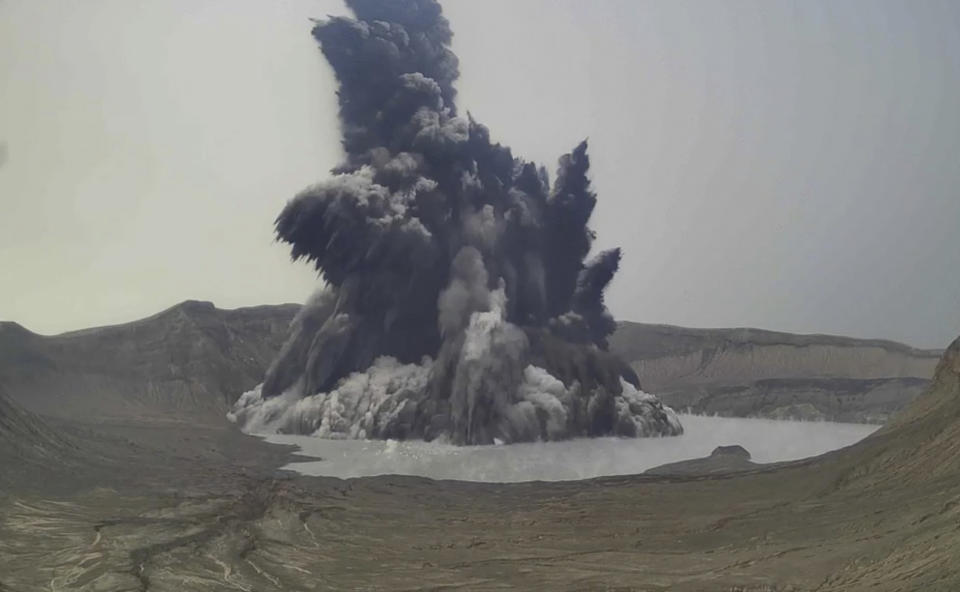 In this image made from video from Philippine Institute of Volcanology and Seismology - Department of Science and Technology, a plume of steam and ash is seen from Taal Volcano, Batangas province, Philippines on Thursday July 1, 2021. A tiny volcano near the Philippine capital belched a plume of steam and ash into the sky in a brief explosion Thursday, prompting an alert level to be raised due to heightened risks to nearby villages. (Philippine Institute of Volcanology and Seismology - Department of Science and Technology via AP)