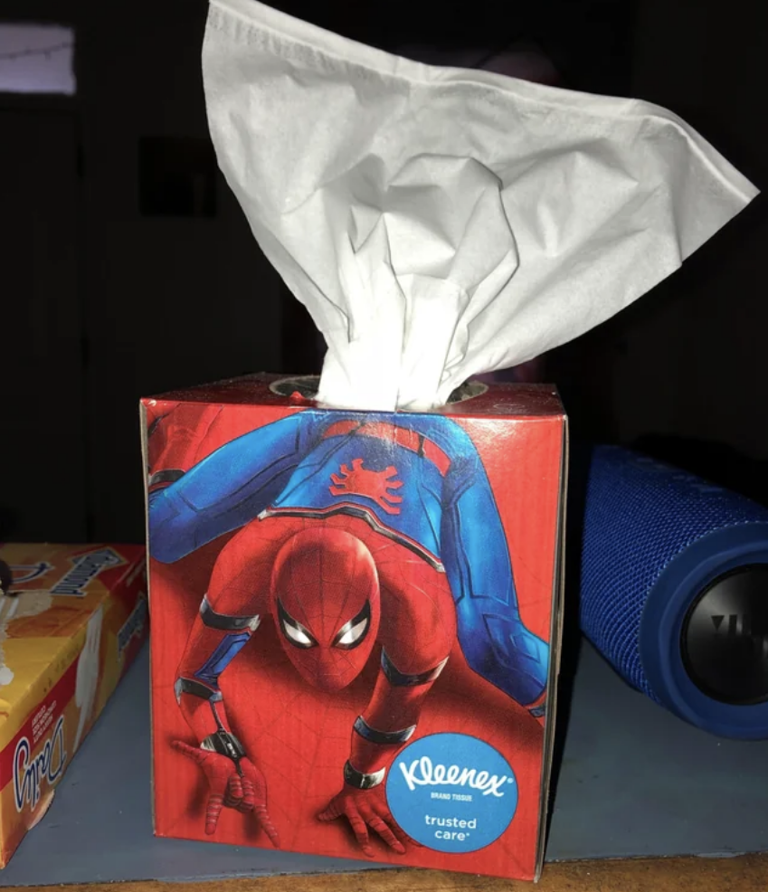 kleenex box designed to look like tissue is coming out of spider-man's butt