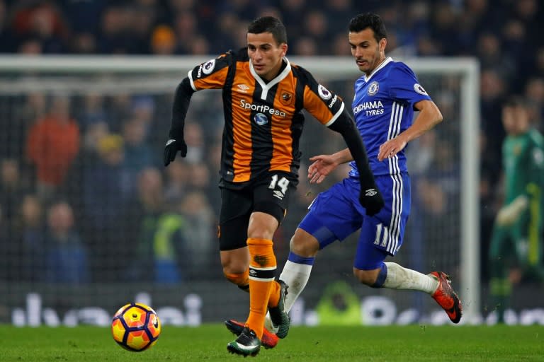 Hull City's Norwegian defender Omar Elabdellaoui (L) vies with Chelsea's Spanish midfielder Pedro during the English Premier League football match between Chelsea and Hull City at Stamford Bridge in London on January 22, 2017