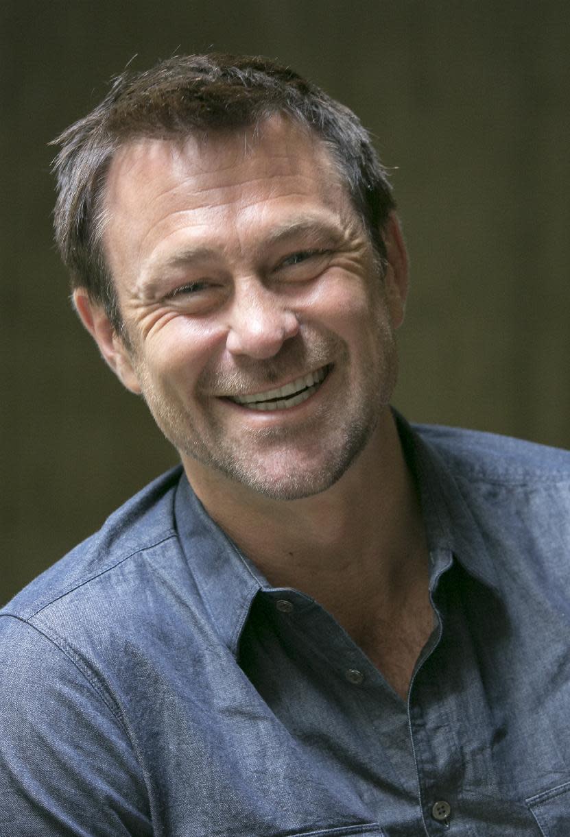 In this Thursday, March 28, 2013, photo Australian actor Grant Bowler poses for a photo in Los Angeles. Bowler plays Joshua Nolan, the local lawman in a border town known as Defiance. The series Defiance will be broadcast on April 15 on the cable channel Syfy. (AP Photo/Damian Dovarganes)