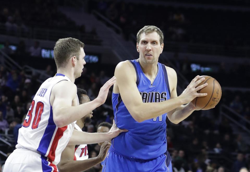 Jon Leuer defends Dirk Nowitzki during a game in February. (AP)