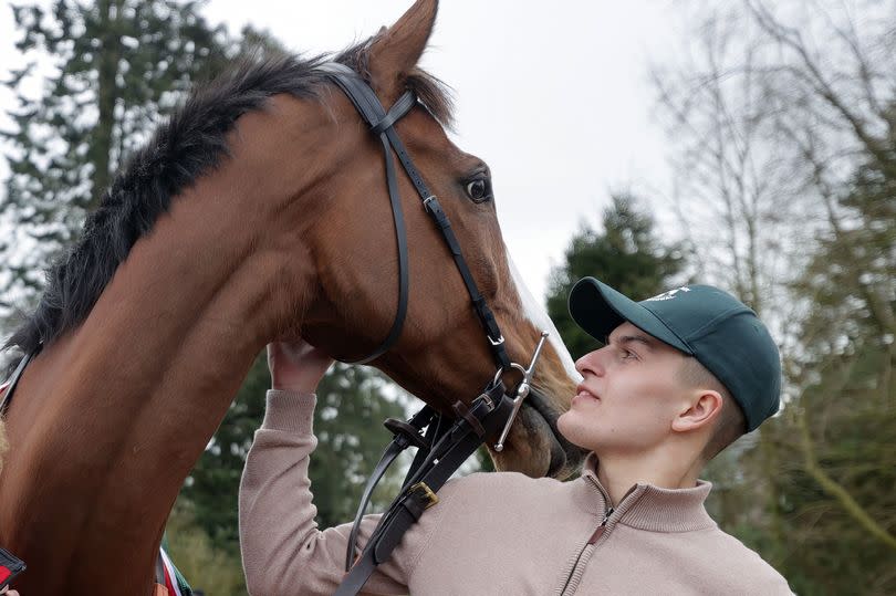 Cameron Sword, 22, with Grand National favourite Corach Rambler