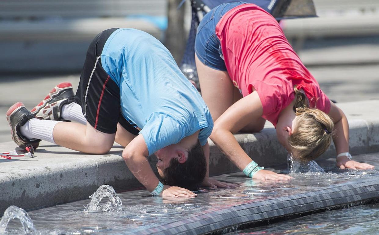 Montreal recommends visiting areas such as parks, swimming pools, mist stations and libraries to cool off during heat waves. (Graham Hughes/The Canadian Press - image credit)