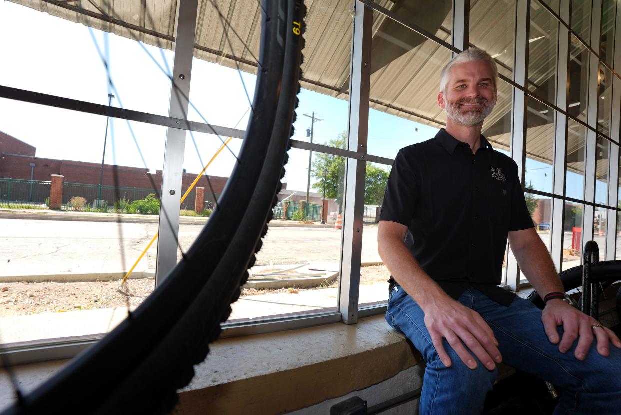 Drew Jordan, owner of Andy Jordan’s Bicycle Warehouse, poses for a portrait inside the store on Friday, June 21, 2024. Andy Jordan’s Bicycle Warehouse is celebrating 50 years of business.