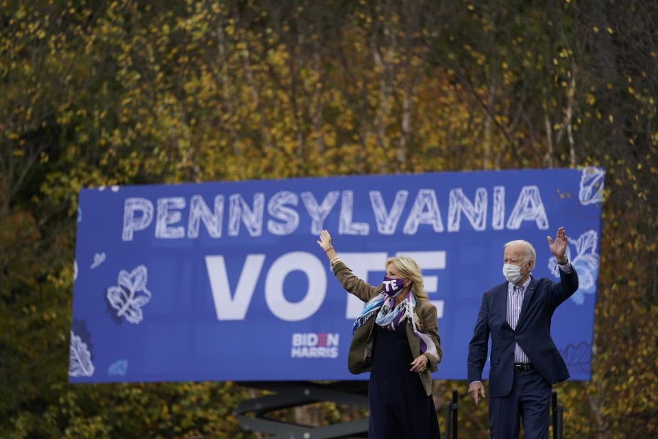 Democratic presidential candidate former Vice President Joe Biden and his wife Jill Biden arrive at a campaign stop at Bucks County Community College, Saturday, Oct. 24, 2020, in Bristol, Pa. (AP Photo/Andrew Harnik)