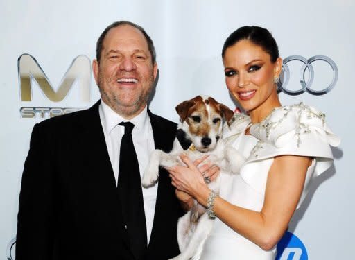 Co-Chairman of The Weinstein Company Harvey Weinstein (L), Uggie the dog and designer Georgina Chapman attend an Oscar after party on February 26. For the second year running the founder of The Weinstein Company steered one of its films to Academy Awards glory, this year with silent movie "The Artist," after last year's victory for "The King's Speech."