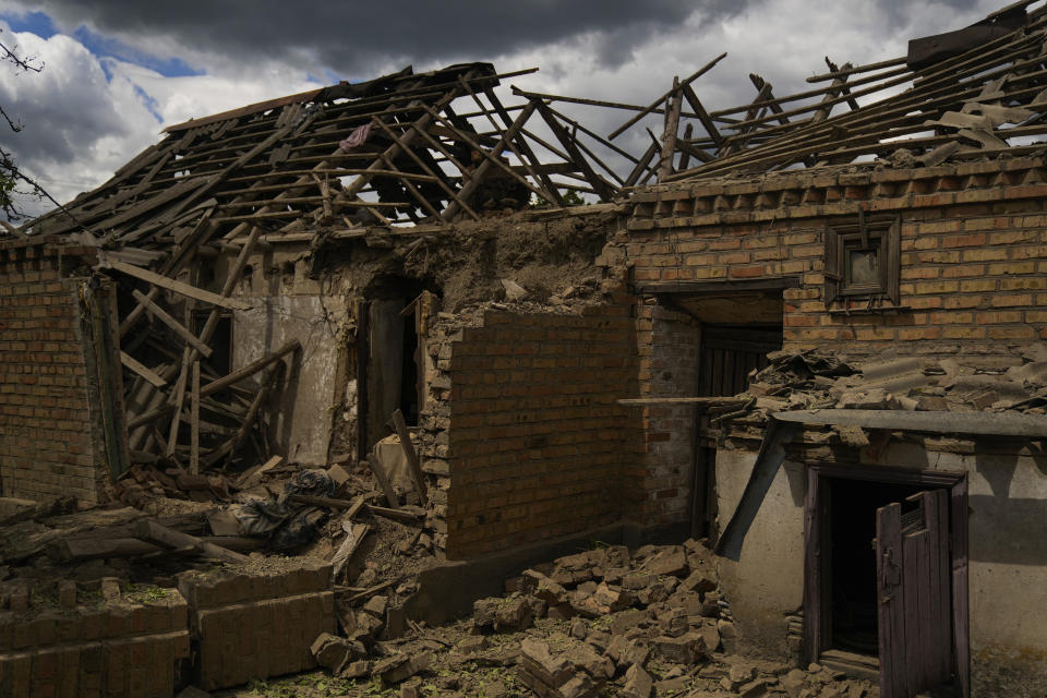 A view of wreckage in a heavily damaged uninhabited house after a Russian bombing early in the morning in Velyka Kostromka village, Ukraine, Thursday, May 19, 2022. (AP Photo/Francisco Seco)