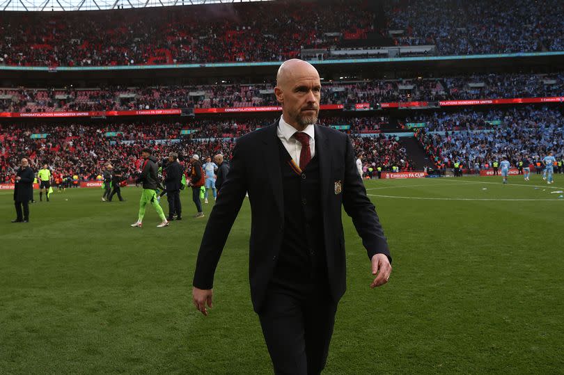 Erik ten Hag walks off the Wembley pitch after the FA Cup semi-final win.