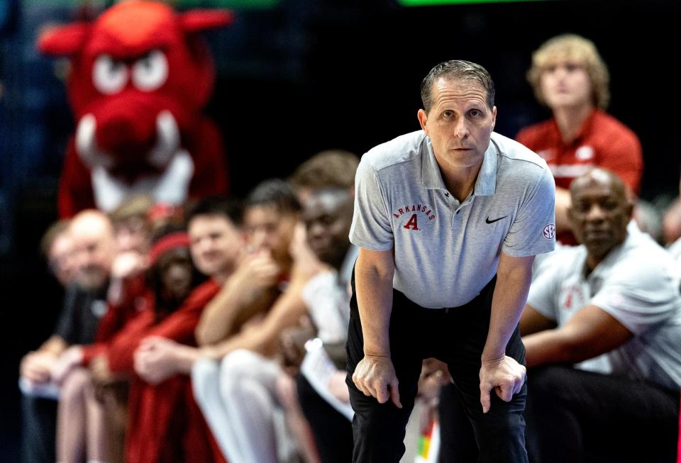 Mar 14; Nashville, Tennessee, United States; Arkansas head coach Eric Musselman watches play during a MenÕs SEC Tournament game against South Carolina at Bridgestone Arena in Nashville, Tennessee.