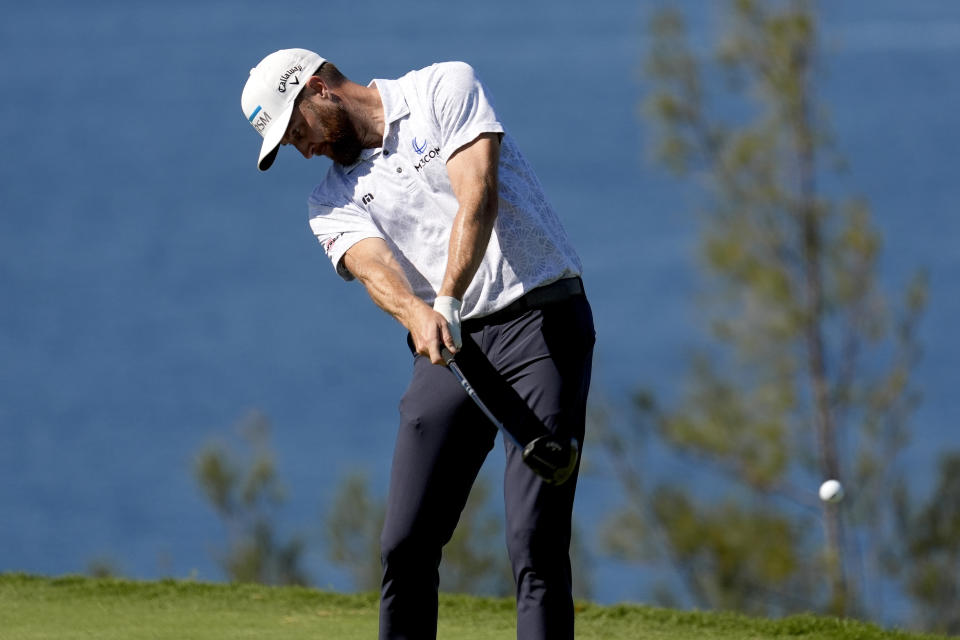 Chris Kirk hits from the 13th tee during the final round of The Sentry golf event, Sunday, Jan. 7, 2024, at Kapalua Plantation Course in Kapalua, Hawaii. (AP Photo/Matt York)