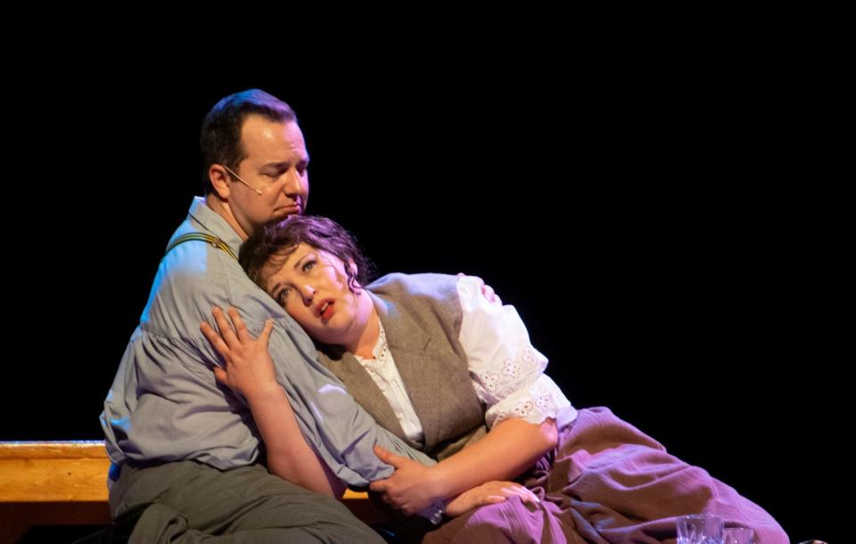 Craig Weiskerger as Leo Frank and Heather Nicole as his wife, Lucille, share a tender moment in the musical “Parade” at the Manatee Performing Arts Center.