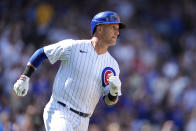 Chicago Cubs' Yan Gomes watches his RBI single off San Francisco Giants starting pitcher Logan Webb during the seventh inning of a baseball game Monday, Sept. 4, 2023, in Chicago. (AP Photo/Charles Rex Arbogast)