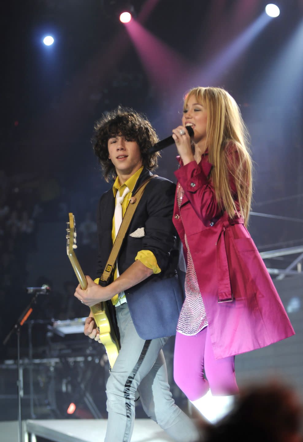 exclusive, premium rates apply uniondale, ny april 07 exclusive nick jonas of the jonas brothers and miley cyrus perform during her best of both worlds tour at nassau coliseum on december 27, 2009 in uniondale, new york photo by kevin mazurwireimage