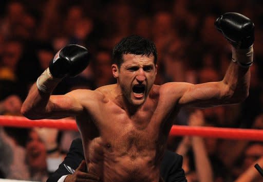 Carl Froch celebrates after beating Lucian Bute during their IBF World Super Middleweight title match in May. He declared he is ready for rematches against Bute, Mikkel Kessler and Andre Ward after an impressive first defence of his IBF super-middleweight title