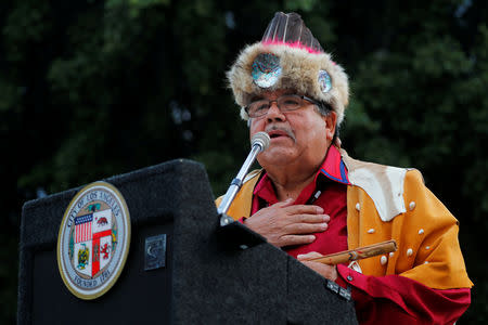 Chief Anthony "Red Blood" Morales of the Tongva tribe speaks during a sunrise celebration at the inaugural Indigenous People's Day in downtown Los Angeles after the Los Angeles City Council voted to establish the second Monday in October as "Indigenous People's Day", replacing Columbus Day, in Los Angeles, California, U.S., October 8, 2018. REUTERS/Mike Blake