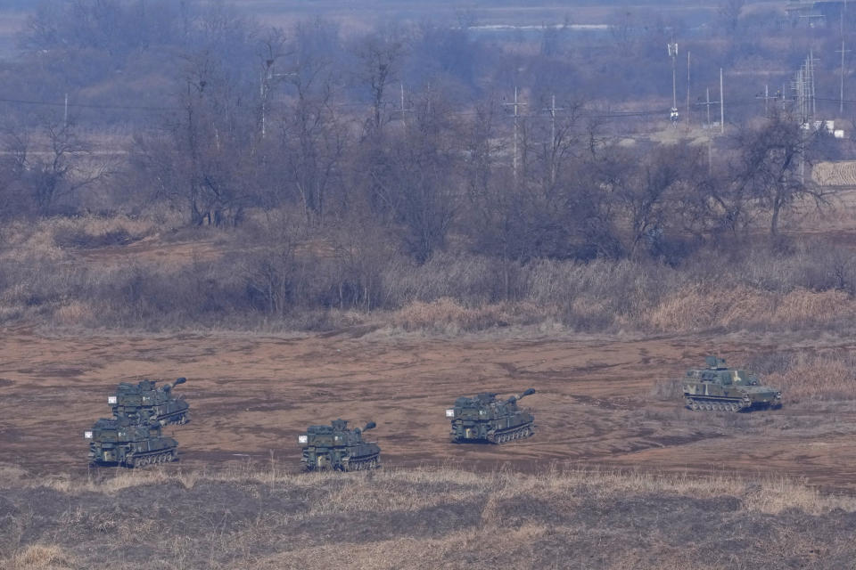 South Korean army K-55 self-propelled howitzers take positions in Paju, South Korea, near the border with North Korea, Wednesday, Jan. 11, 2023. North Korea's spike in missile tests, growing nuclear ambitions and other provocative acts pose a "serious threat" that could lead to a dangerous miscalculation and spark a wider conflict, South Korean President Yoon Suk Yeol said Tuesday. (AP Photo/Ahn Young-joon)