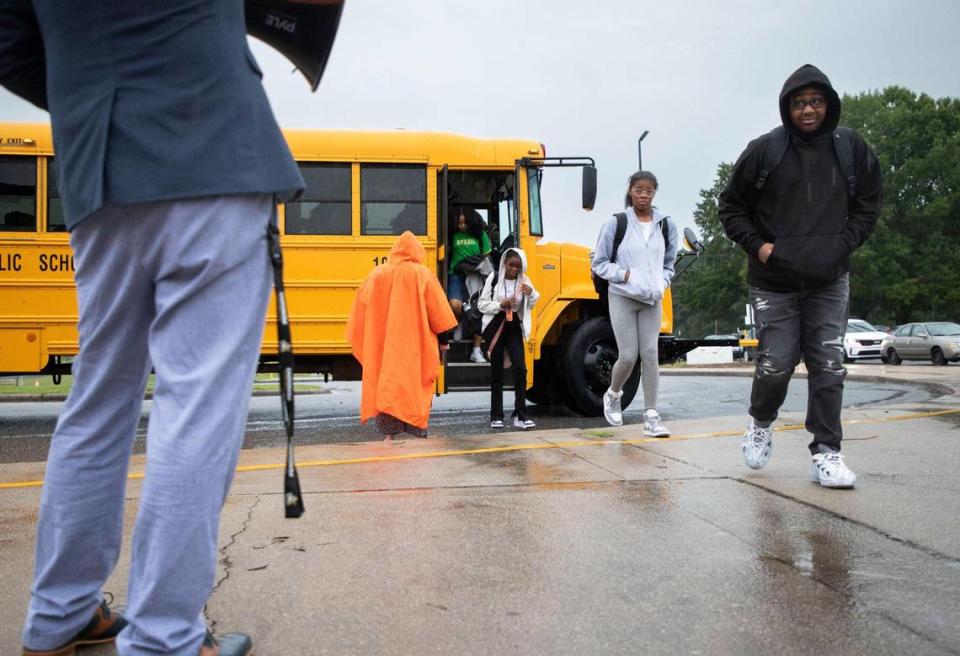 Students walk into Northwest Cabarrus STEM Middle School on the first day of school Thursday, August 10, 2023. Teachers and staff greeted students as they walked to their first class.