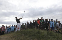 Ireland's Shane Lowry plays out of the rough on the14th hole during the third round of the British Open Golf Championships at Royal Portrush in Northern Ireland, Saturday, July 20, 2019.(AP Photo/Peter Morrison)